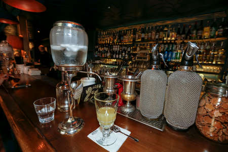 Prague, Czech Republic - June 02, 2017 - preparation of traditional absinthe in bar on old town of pragueのeditorial素材