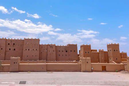 Frontside of Kasbah Taourirt, former fortress palace mud-built in the village of Ouarzazate. It is dubbed the "desert door" and is located on southern Morocco.のeditorial素材