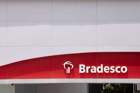 Sao Paulo, Brazil -  december 29 2019 - Closeup of the lettering and logo of  Bradesco bank branch. Facade of bank branch, advertising sign and logoのeditorial素材