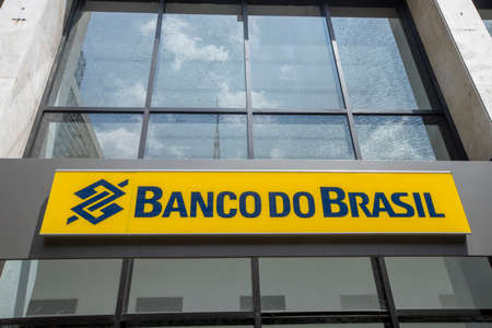 Sao Paulo, Brazil -  december 29 2019 - Lettering and logo of Banco do Brasil bank branch. Facade of...