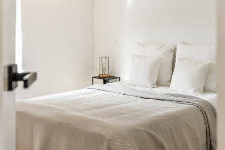 Interior of bright bedroom. Cozy bright bedroom interior. Modern bedroom design
