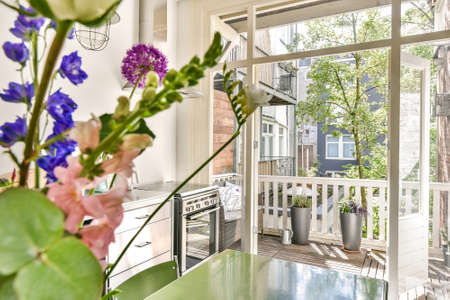 Beautiful kitchen interior design with a balcony