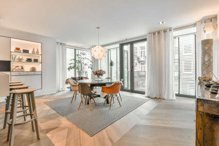 Spacious dining room in a luxurious house with an elegance styleの写真素材