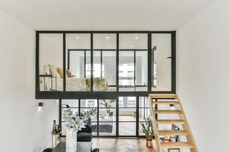 House in an unusual design with glass windowsの写真素材