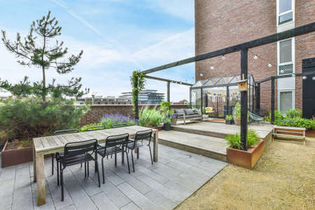 A large open-air terrace on the roof-top with lounge spaceの写真素材
