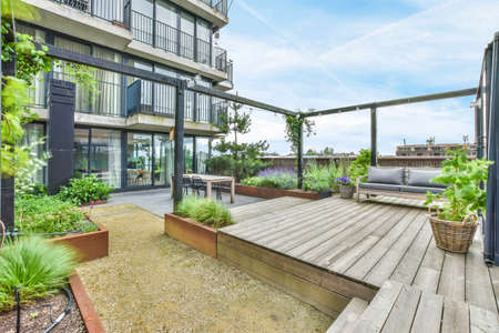 A large open-air terrace on the roof-top with lounge spaceの写真素材