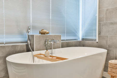 Bright elegant bathroom interior in a luxury houseの写真素材