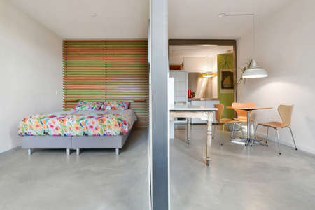 Side view of bedroom and dining roomの写真素材