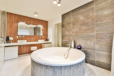 Bright elegant bathroom interior in a luxury houseの写真素材