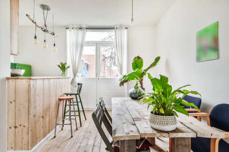 Cozy dining room in a luxury house with modern designの写真素材