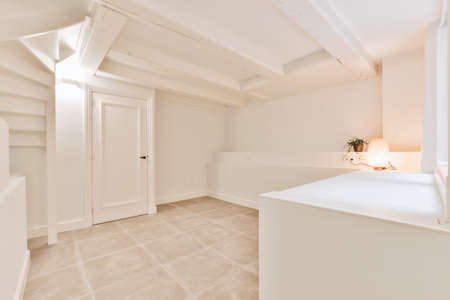 A cozy and spacious empty room in a luxury houseの写真素材