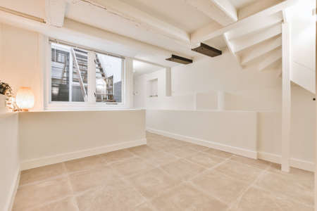 A cozy and spacious empty room in a luxury houseの写真素材