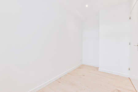 Interior of modern empty room with white walls in new apartment in minimal style