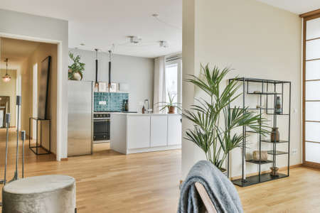 Interior of spacious modern living room with glass terrace door in spacious flatの写真素材