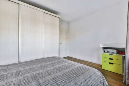 Stylish bedroom design in an elegant houseの写真素材