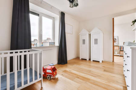 A cozy and spacious room in a luxury houseの写真素材