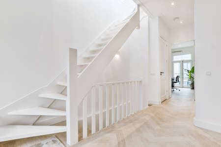 Luxury staircase hall of special design in an elegant houseの写真素材