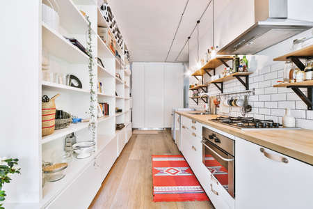 Interior of a beautiful kitchen of an elite houseの写真素材