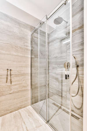Luxury interior design of a bathroom with marble wallsの写真素材
