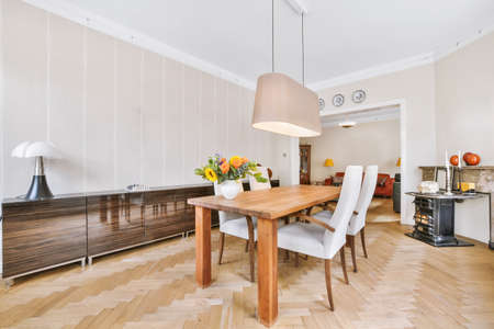 Bright dining room with decorative table and chairs