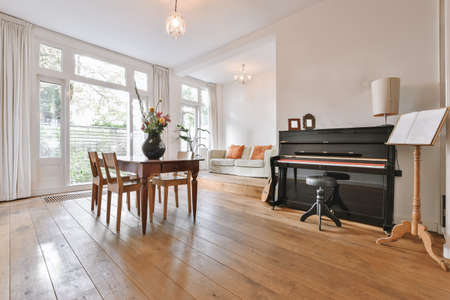 Bright dining room with decorative table and chairs