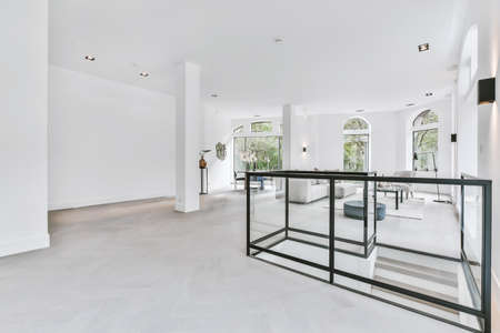 A cozy and spacious room in a luxury houseの写真素材