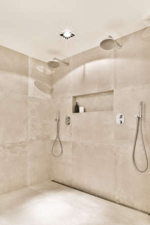 Modern shower stall in a bright bathroomの写真素材