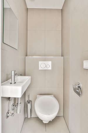 Interior of small clean washroom in miniature styleの写真素材