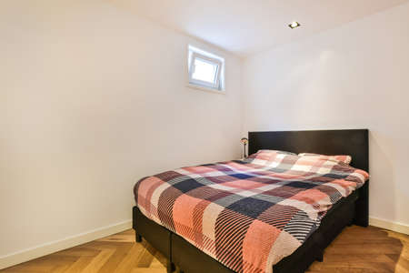 Interior of a cozy and bright bedroom with beautiful decoration