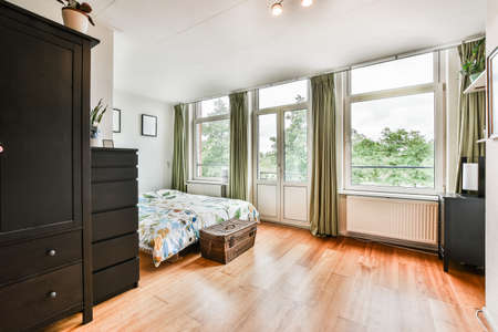 Interior of a cozy and bright bedroom with beautiful decoration