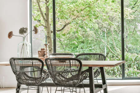 Bright dining room with decorative table and chairs