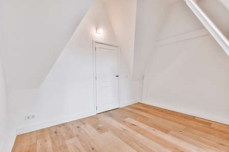 A cozy and spacious room in a luxury houseの写真素材