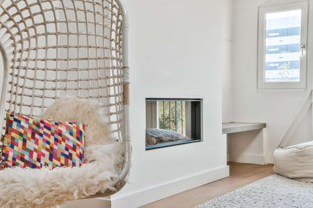 A cozy and spacious room in a luxury houseの写真素材