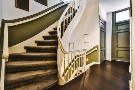 Luxury staircase hall of special design in an elegant houseの写真素材