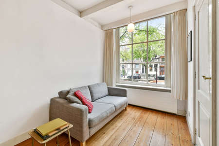 Interior of bright living room with stylish furnitureの写真素材