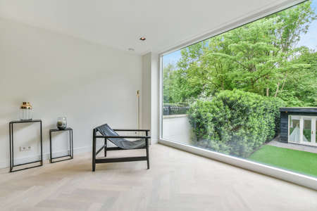 A cozy and spacious room in a luxury houseの写真素材