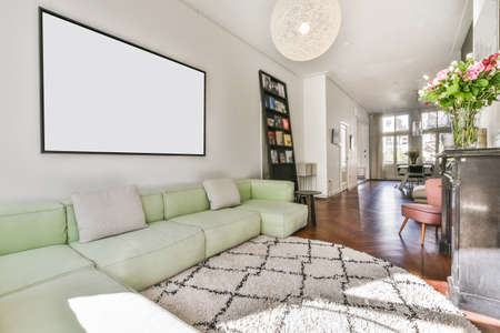Interior of bright living room with stylish furniture