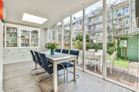 Interior design of bright and beautiful dining zone in house