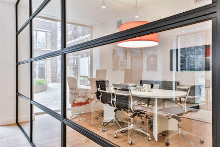 A cozy and spacious office room in a luxury design