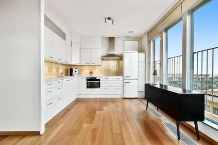 A bright kitchen in an elegant house