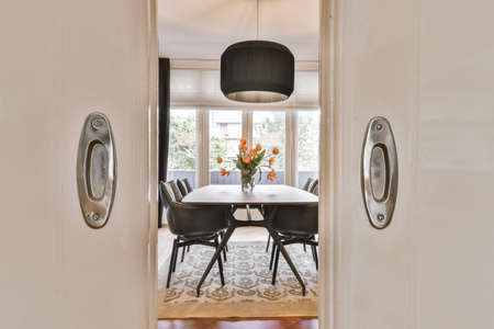 Modern dining room in a luxury house with individual design