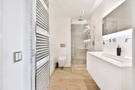 Bright and stylish bathroom with luxury bathtubの写真素材