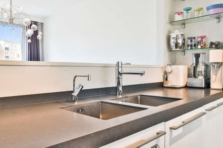 Close up of elegant sink in luxury kitchen