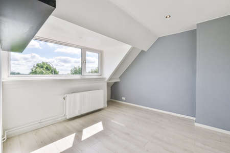 A cozy and bright room in a luxury houseの写真素材