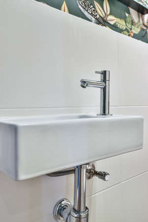 Close up of luxury faucet in an elegant bathroom