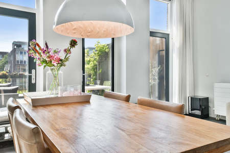 Spacious dining room of a luxury houseの写真素材