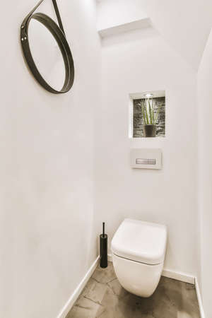 Interior of small clean toilet in miniature styleの写真素材