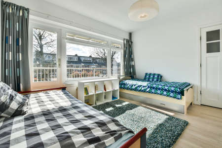 Interior of a cozy and bright bedroom with beautiful decoration