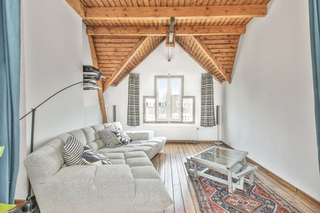 Elegant and spacious living room with beautiful furnitureの写真素材