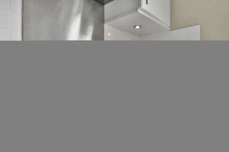 A bright kitchen in an elegant houseの写真素材